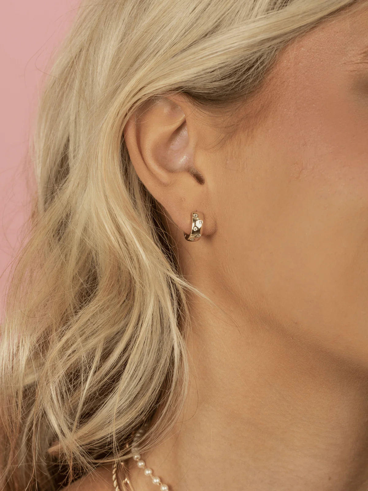 Charlotte CZ Dome Huggie Earrings